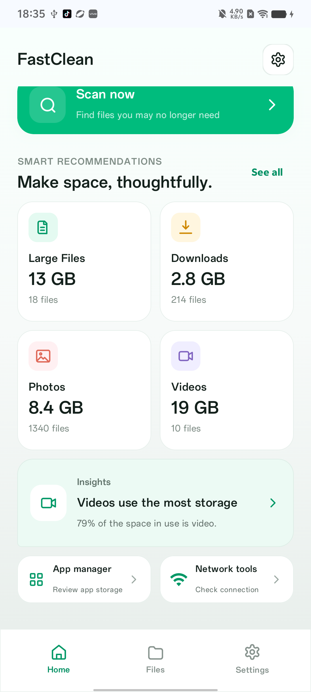 FastClean Android home screen showing Scan now, large files, downloads, photos and videos
